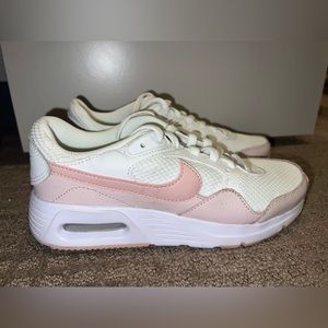 Pink and white Nikes, size 5, lightly used